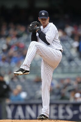NEW YORK, NY - APRIL 07:  A.J. Burnett #34 of the New York Yankees pitches against the Minnesota Twins at Yankee Stadium on April 7, 2011 in the Bronx borough of New York City.  (Photo by Nick Laham/Getty Images)