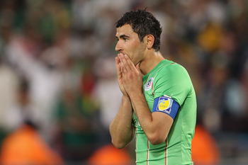 PRETORIA, SOUTH AFRICA - JUNE 23:  Anther Yahia of Algeria reacts during the 2010 FIFA World Cup South Africa Group C match between USA and Algeria at the Loftus Versfeld Stadium on June 23, 2010 in Tshwane/Pretoria, South Africa.  (Photo by Phil Cole/Get