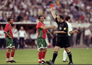 9 Jun 1999:  Referee Mario van der Ende sends off Martin Petrov (no. 18) of Bulgaria despite the protests of team mate Hristo Stoichkov in the European Championship qualifier against England at the Bulgarska Armia Stadium in Sofia, Bulgaria. The game ende