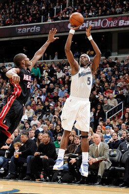 WASHINGTON, DC - DECEMBER 18:  Josh Howard #5 of the Washington Wizards shoots a jump shot against the Miami Heat at the Verizon Center on December 18, 2010 in Washington, DC. NOTE TO USER: User expressly acknowledges and agrees that, by downloading and o