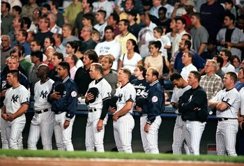 10 Sep 1999:  The New York Yankees take a moment of silence for the passing of Jim 'Catfish' Hunter before the game against the Boston Red Sox at Yankee Stadium in Bronx, New York. The Red Sox defeated the Yankees 4-1. Mandatory Credit: Ezra O. Shaw  /All
