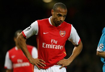 LONDON - MARCH 07:  A dejected Thierry Henry of Arsenal looks on as the final whistle blows during the UEFA Champions League round of sixteen, second leg match between Arsenal and PSV Eindhoven at The Emirates Stadium on March 7, 2007 in London, England. 