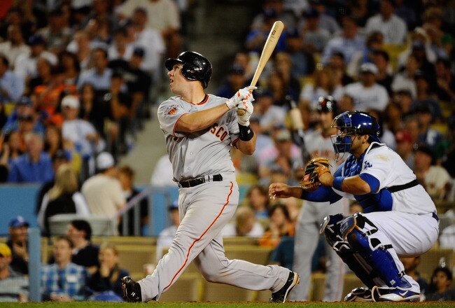 LOS ANGELES, CA - MARCH 31:  Buster Posey #28 of the San Francisco Giants grounds out against the Los Angeles Dodgers on Opening Day at Dodger Stadium on March 31, 2011 in Los Angeles, California.  (Photo by Kevork Djansezian/Getty Images)