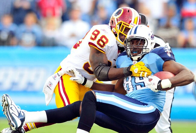 NASHVILLE, TN - NOVEMBER 21:  Brian Orakpo #98 of the Washington Redskins forces Jared Cook #89 of the Tennessee Titans out-of-bounds at LP Field on November 21, 2010 in Nashville, Tennessee. The Redskins won 19-16 in overtime.  (Photo by Grant Halverson/
