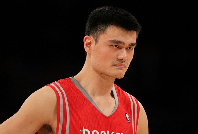 LOS ANGELES, CA - OCTOBER 26:  Yao Ming #11 of the Houston Rockets looks on during their opening night game against the Los Angeles Lakers at Staples Center on October 26, 2010 in Los Angeles, California. NOTE TO USER: User expressly acknowledges and agre