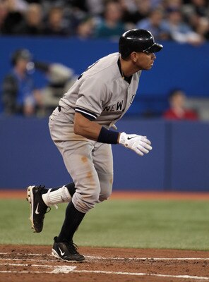 TORONTO, ON - APRIL 20:  Alex Rodriguez #13 of the New York Yankees watches his sacrifice fly ball during their game against the Toronto Blue Jays at Rogers Centre on April 20, 2011 in Toronto, Canada.  (Photo by Scott Halleran/Getty Images)