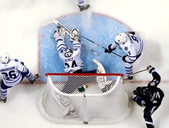 TAMPA, FL - JANUARY 25:  James Reimer #34 of the Toronto Maple Leafs makes a save against the Tampa Bay Lightning at St. Pete Times Forum on January 25, 2011 in Tampa, Florida.  The Lightning defeated the Leafs 2-0.  (Photo by Justin K. Aller/Getty Images