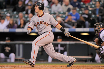 DENVER, CO - APRIL 19:  Buster Posey #28 of the San Francisco Giants takes an at bat against the Colorado Rockies at Coors Field on April 19, 2011 in Denver, Colorado.  (Photo by Doug Pensinger/Getty Images)