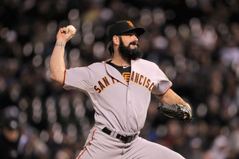 DENVER, CO - APRIL 19:  Closer Brian Wilson #38 of the San Francisco Giants pitches in relief in the ninth inning against the Colorado Rockies at Coors Field on April 19, 2011 in Denver, Colorado. Wilson earned a save as the Giants defeated the Rockies 6-