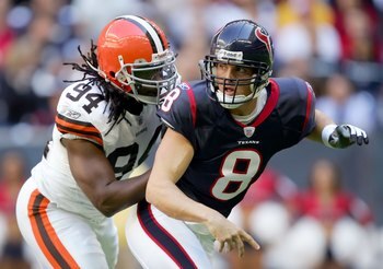 HOUSTON, TX - DECEMBER 31:  Quarterback David Carr #8 of the Houston Texans passes under pressure from Leon Williams #94 the Cleveland Browns on December 31, 2006 at Reliant Stadium in Houston, Texas. The Texans defeated the Browns 14-6.  (Photo by Lisa B