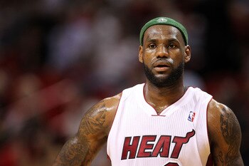 MIAMI, FL - APRIL 06: Lebron James #6 of the Miami Heat looks on during a game against the Milwaukee Bucks at American Airlines Arena on April 6, 2011 in Miami, Florida. NOTE TO USER: User expressly acknowledges and agrees that, by downloading and/or usin