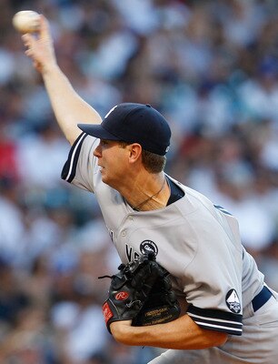 CLEVELAND - JULY 29:  Dustin Mosely #40 of the New York Yankees pitches against the Cleveland Indians during the game on July 29, 2010 at Progressive Field in Cleveland, Ohio.  (Photo by Jared Wickerham/Getty Images)