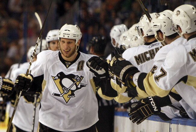 TAMPA, FL - APRIL 25: Jordan Staal #11 of the Pittsburgh Penguins celebrates a goal with teammates against the Tampa Bay Lightning in Game Six of the Eastern Conference Quarterfinals during the 2011 NHL Stanley Cup Playoffs at the St. Pete Times Forum on