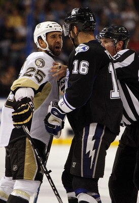 TAMPA, FL - APRIL 25: Maxime Talbot #25 of the Pittsburgh Penguins has a disagreement with Teddy Purcell #16 of the Tampa Bay Lightning in Game Six of the Eastern Conference Quarterfinals during the 2011 NHL Stanley Cup Playoffs at the St. Pete Times Foru
