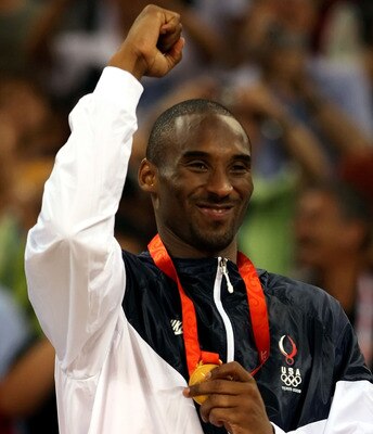 BEIJING - AUGUST 24:  Kobe Bryant #10 of the United States celebrates on the podium after defeating Spain 118-107 in the gold medal game during Day 16 of the Beijing 2008 Olympic Games at the Beijing Olympic Basketball Gymnasium on August 24, 2008 in Beij