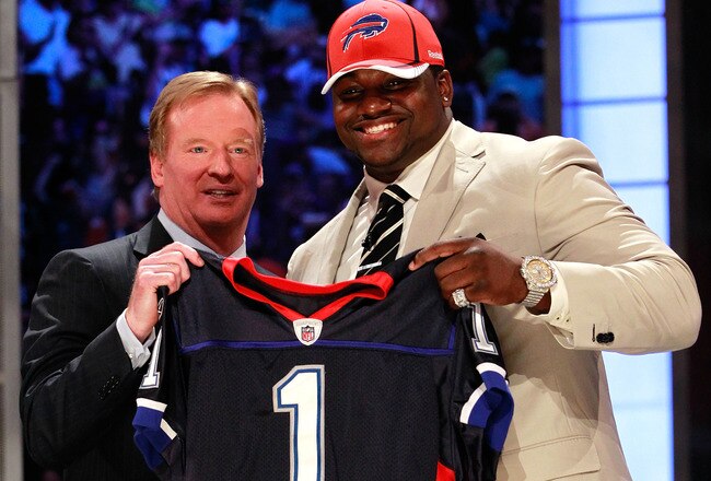 NEW YORK, NY - APRIL 28:  NFL Commissioner Roger Goodell poses for a photo with Marcell Dareus, #3 overall pick by the Buffalo Bills, as Dareus holds up a jersey during the 2011 NFL Draft at Radio City Music Hall on April 28, 2011 in New York City.  (Phot