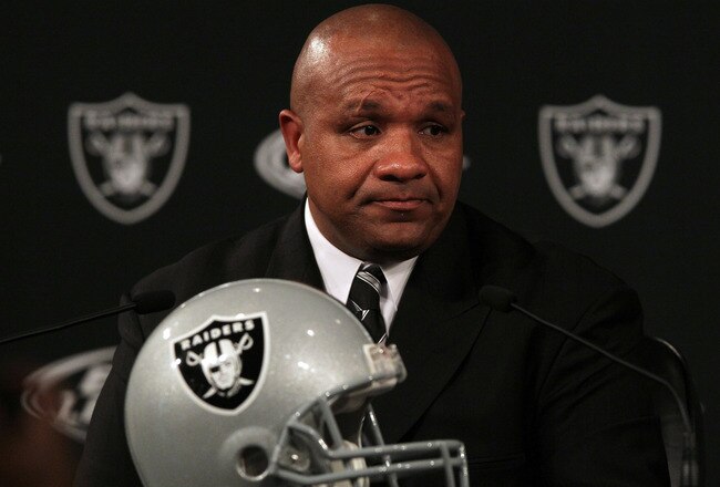 ALAMEDA, CA - JANUARY 18:  New Oakland Raiders coach Hue Jackson pauses as he speaks to reporters during a press conference on January 18, 2011 in Alameda, California. Hue Jackson was introduced as the new coach of the Oakland Raiders, replacing the fired