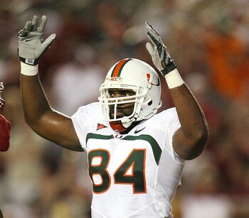 TALLAHASSEE, FL - SEPTEMBER 07:  Tight end Richard Gordon #84 of the Miami Hurricanes celebrates after a fourth quarter touchdown by running back Graig Cooper #32 against the Florida State Seminoles at Doak Campbell Stadium on September 7, 2009 in Tallaha