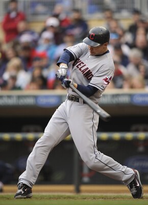 MINNEAPOLIS, MN - APRIL 23: Grady Sizemore #24 of the Cleveland Indians hits a two-run home run against the Minnesota Twins during the eighth inning of their game on April 23, 2011 at Target Field in Minneapolis, Minnesota. (Photo by Hannah Foslien/Getty