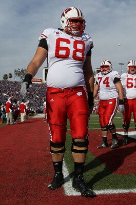 PASADENA, CA - JANUARY 01:  Offensive lineman Gabe Carimi #68 of the Wisconsin Badgers warms up prior to playing the TCU Horned Frogs in the 97th Rose Bowl game on January 1, 2011 in Pasadena, California.  (Photo by Stephen Dunn/Getty Images)