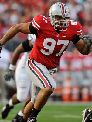 COLUMBUS, OH - NOVEMBER 13:  Cameron Heyward #97 of the Ohio State Buckeyes chases after quarterback Matt McGloin #11 of the Penn State Nittany Lions at Ohio Stadium on November 13, 2010 in Columbus, Ohio.  (Photo by Jamie Sabau/Getty Images)