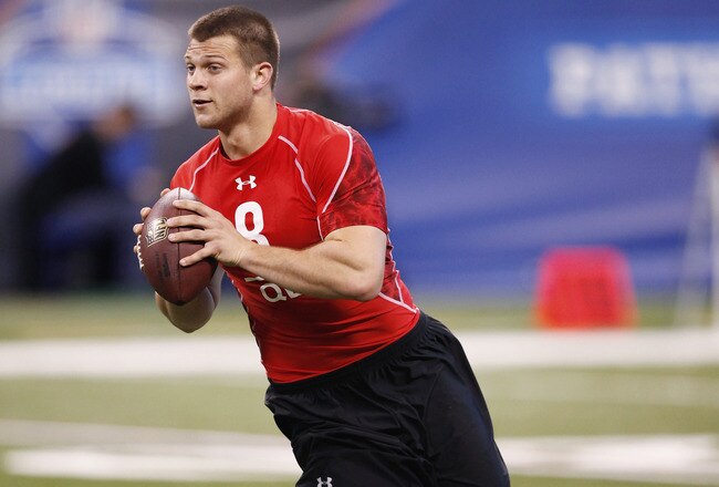 INDIANAPOLIS, IN - FEBRUARY 27:  Quarterback Jake Locker of Washington runs a passing drill during the 2011 NFL Scouting Combine at Lucas Oil Stadium on February 27, 2011 in Indianapolis, Indiana. (Photo by Joe Robbins/Getty Images)
