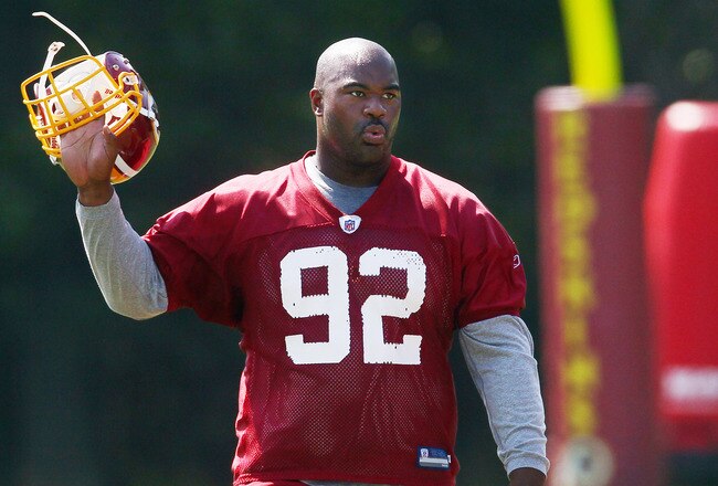 ASHBURN, VA - AUGUST 06:  Defensive lineman Albert Haynesworth #92 of the Washington Redskins walks off the field after missing his eighth consecutive day of practice during Redskins training camp on August 6, 2010 in Ashburn, Virginia.  (Photo by Win McN