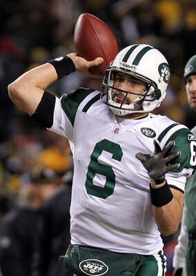 PITTSBURGH, PA - JANUARY 23:  Mark Sanchez #6 of the New York Jets warms up in front of offensive coordinator Brian Schottenheimer against the Pittsburgh Steelers during the 2011 AFC Championship game at Heinz Field on January 23, 2011 in Pittsburgh, Penn