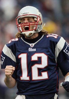FOXBORO, MA - JANUARY 02:  Tom Brady #12 of the New England Patriots celebrates a touchdown by teammate BenJarvis Green-Ellis in the first quarter against the Miami Dolphins on January 2, 2011 at Gillette Stadium in Foxboro, Massachusetts.  (Photo by Elsa