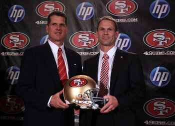 SAN FRANCISCO, CA - JANUARY 07:  Jim Harbaugh and general manager Trent Baalke pose for a picture following a press conference where Harbaugh was introduced as the new San Francisco 49ers head coach at the Palace Hotel on January 7, 2011 in San Francisco,