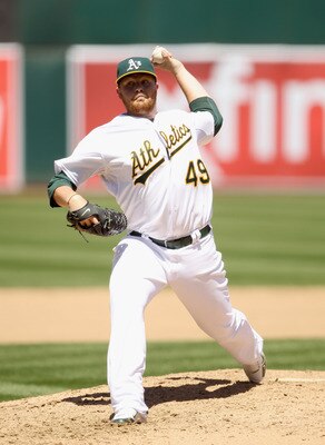 OAKLAND, CA - APRIL 30:  Brett Anderson #49 of the Oakland Athletics pitches against the Texas Rangers at Oakland-Alameda County Coliseum on April 30, 2011 in Oakland, California.  (Photo by Ezra Shaw/Getty Images)