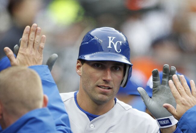 DETROIT - APRIL 09: Jeff Francoeur #21 of the Kansas City Royals is congratulated by his teammates after scoring in the second inning during the game against the Detroit Tigers at Comerica Park on April 9, 2011 in Detroit, Michigan.  (Photo by Leon Halip/