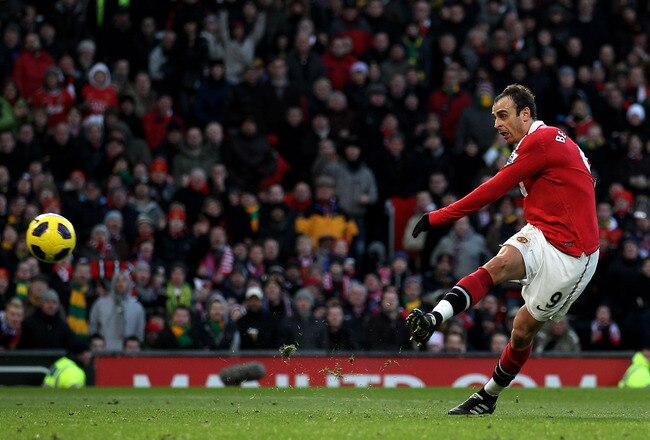 MANCHESTER, ENGLAND - NOVEMBER 27:  Dimitar Berbatov of Manchester United scores his team's third goal during the Barclays Premier League match between Manchester United and Blackburn Rovers at Old Trafford on November 27, 2010 in Manchester, England.  (P