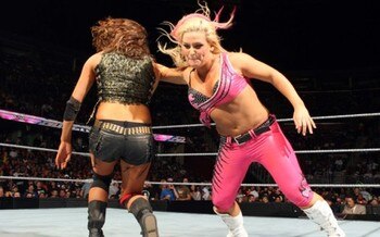 Natalya-delivers-a-devastating-blow-to-the-beautiful-eve-in-the-main-event-of-wwe-superstars