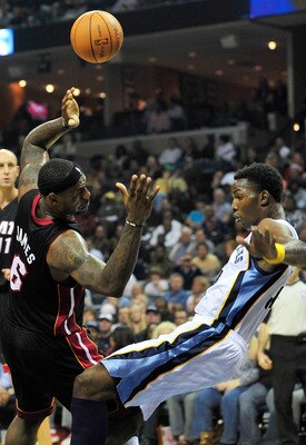 MEMPHIS, TN - NOVEMBER 20:  LeBron James #6 of the Miami Heat draws a blocking foul on Hasheem Thabeet #34 of the Memphis Grizzlies at FedExForum on November 20, 2010 in Memphis, Tennessee.  NOTE TO USER: User expressly acknowledges and agrees that, by do