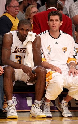 LOS ANGELES, CA - JUNE 06:  (L-R) Lamar Odom #7, Adam Morrison #6, Ron Artest #37, Luke Walton #4 and Shannon Brown #12 of the Los Angeles Lakers sit on the bench near the end of the Lakers' loss to the Boston Celtics in Game Two of the 2010 NBA Finals at