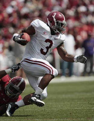 TUSCALOOSA, AL - APRIL 17:  Running back Trent Richardson #3 of the University of Alabama Crimson Tide runs for a first down during the Alabama spring game at Bryant Denny Stadium on April 17, 2010 in Tuscaloosa, Alabama. (Photo by Dave Martin/Getty Image