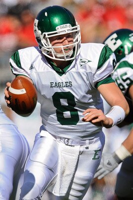 COLUMBUS, OH - SEPTEMBER 25:  Quarterback Alex Gillett #8 of the Eastern Michigan Eagles hands off the ball against the Ohio State Buckeyes at Ohio Stadium on September 25, 2010 in Columbus, Ohio.  Ohio State won 73-20. (Photo by Jamie Sabau/Getty Images)