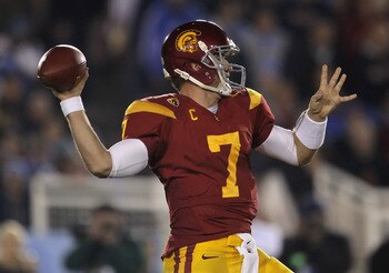 PASADENA, CA - DECEMBER 04:  Quarterback Matt Barkley #7 of the USC Trojans drops back to pass against the UCLA Bruins during the first half at the Rose Bowl on December 4, 2010 in Pasadena, California.  (Photo by Jeff Gross/Getty Images)