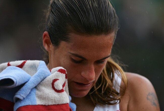 PARIS - JUNE 1:  Amelie Mauresmo of France after losing her quarterfinal match against Elena Dementieva of Russia during Day Nine of the 2004 French Open Tennis Championship at Roland Garros June 1, 2004 in Paris, France. (Photo by Clive Brunskill/Getty I