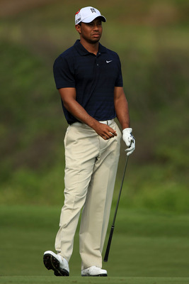 PONTE VEDRA BEACH, FL - MAY 12:  Tiger Woods watches his approach shot on the seventh hole during the first round of THE PLAYERS Championship held at THE PLAYERS Stadium course at TPC Sawgrass on May 12, 2011 in Ponte Vedra Beach, Florida.  (Photo by Stre