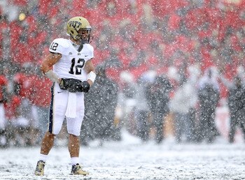 CINCINNATI, OH - DECEMBER 04:  Tino Sunseri #12 of the Pittsburgh Panthers looks to the sidelines during the Big East Conference game against the Cincinnati Bearcats at Nippert Stadium on December 4, 2010 in Cincinnati, Ohio.  Pittsburgh won 28-10.  (Phot
