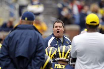 ANN ARBOR, MI - APRIL 16:  Head football coach Brady Hoke talks with his team during the annual Spring Game at Michigan Stadium on April 16, 2011 in Ann Arbor, Michigan.  (Photo by Leon Halip/Getty Images)