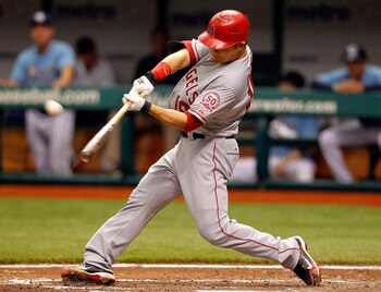 ST. PETERSBURG, FL - MAY 01:  Catcher Hank Conger #16 of the Los Angeles Angels of Anaheim hits a solo home run against the Tampa Bay Rays during the game at Tropicana Field on May 1, 2011 in St. Petersburg, Florida.  (Photo by J. Meric/Getty Images)