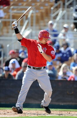 PHOENIX, AZ - FEBRUARY 27:  Hank Conger #16 of the Los Angeles Angels of Anaheim reacts to his strikeout against the Los Angeles Dodgers during spring training at Camelback Ranch on February 27, 2011 in Phoenix, Arizona.  (Photo by Harry How/Getty Images)