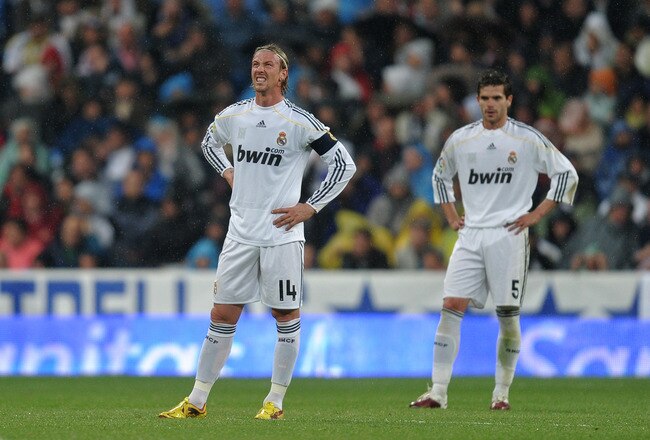 MADRID, SPAIN - MAY 08:  Jose Maria Gutierrez (L) and Fernando Gago of Real Madrid stand dejected after conceding a goal during the La Liga match between Real Madrid and Athletic Bilbao at the Estadio Santiago Bernabeu on May 8, 2010 in Madrid, Spain.  (P
