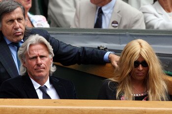 WIMBLEDON, ENGLAND - JULY 03:  Ilie Nastase (L), Bjorn Borg (C) and wife his Patricia (R) look on from Centre Court on Day Eleven of the Wimbledon Lawn Tennis Championships at the All England Lawn Tennis and Croquet Club on July 3, 2009 in London, England