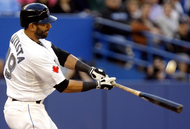TORONTO, CANADA - MAY 9:  Jose Bautista #19 of the Toronto Blue Jays hits during MLB action against the Detroit Tigers at the Rogers Centre May 9, 2011 in Toronto, Ontario, Canada. (Photo by Abelimages/Getty Images)