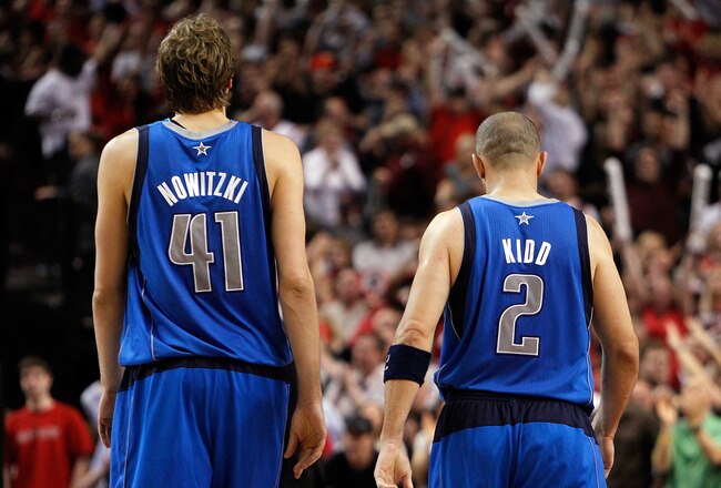 PORTLAND, OR - APRIL 23:   Dirk Nowitzki #41 and Jason Kidd #2 of the Dallas Mavericks walks off the floor against the Portland Trail Blazers in Game Four of the Western Conference Quarterfinals in the 2011 NBA Playoffs on April 23, 2011 at the Rose Garde