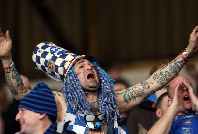 BURNLEY, ENGLAND - FEBRUARY 27:  John Anthony Portsmouth Football Club Westwood sings during the Barclays Premier League match between Burnley and Portsmouth at Turf Moor on February 27, 2010 in Burnley, England.  (Photo by Bryn Lennon/Getty Images)